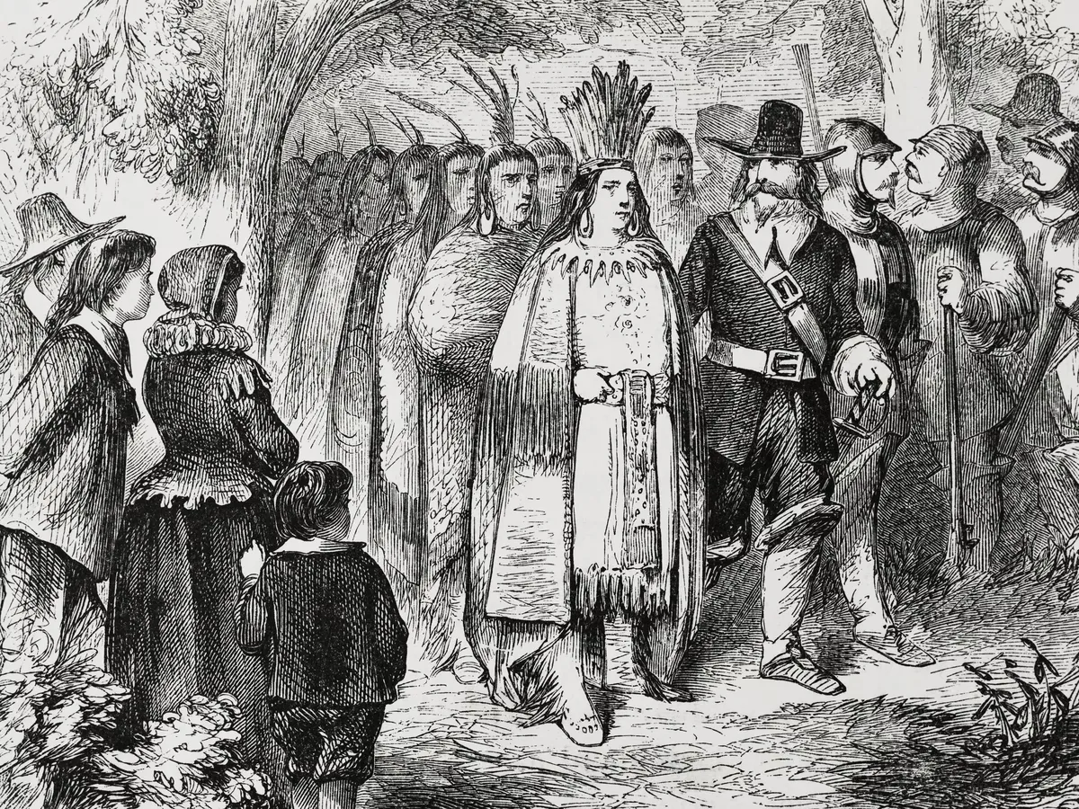 Representação do Primeiro Dia de Ação de Graças, uma celebração histórica entre colonos e povos indígenas na América do Norte, destacando um banquete compartilhado que marcou o início de uma tradição cultural e espiritual nos Estados Unidos. Ideal para conteúdos sobre a história do Dia de Ação de Graças